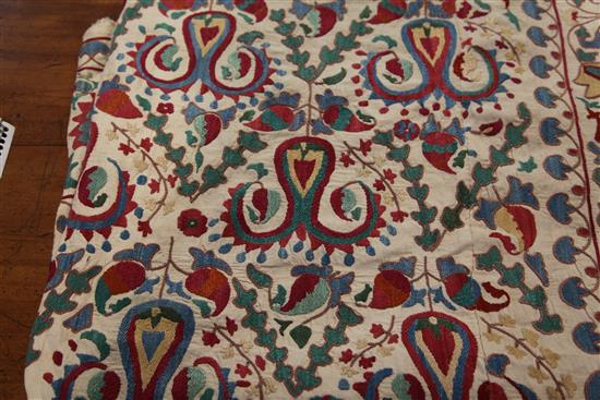 A late 19th century / early 20th century Caucasian directional patterned Suzani, 235cm x 170cm